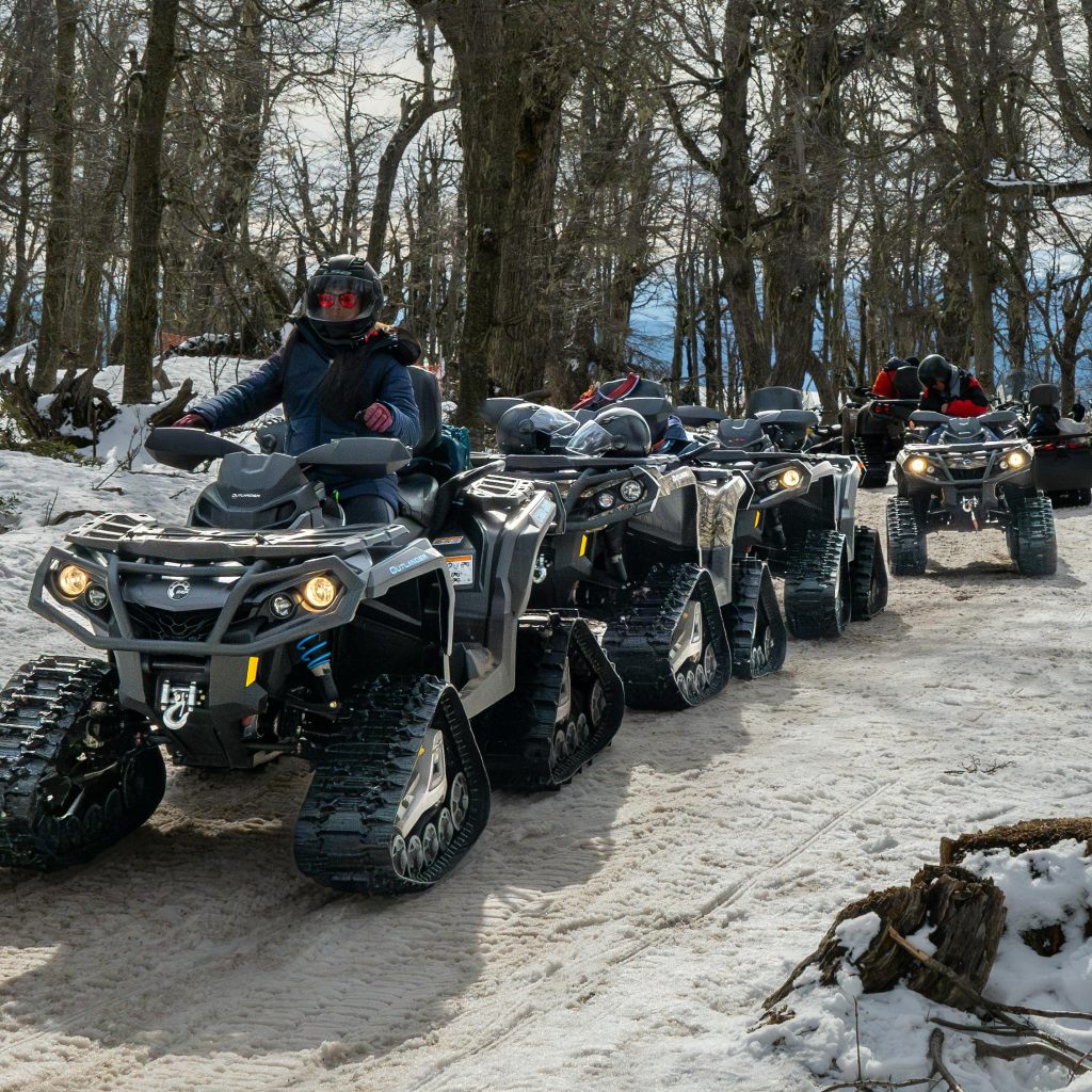Explore a thrilling ATV ride through the snowy forests of San Carlos de Bariloche, Argentina, in winter.
