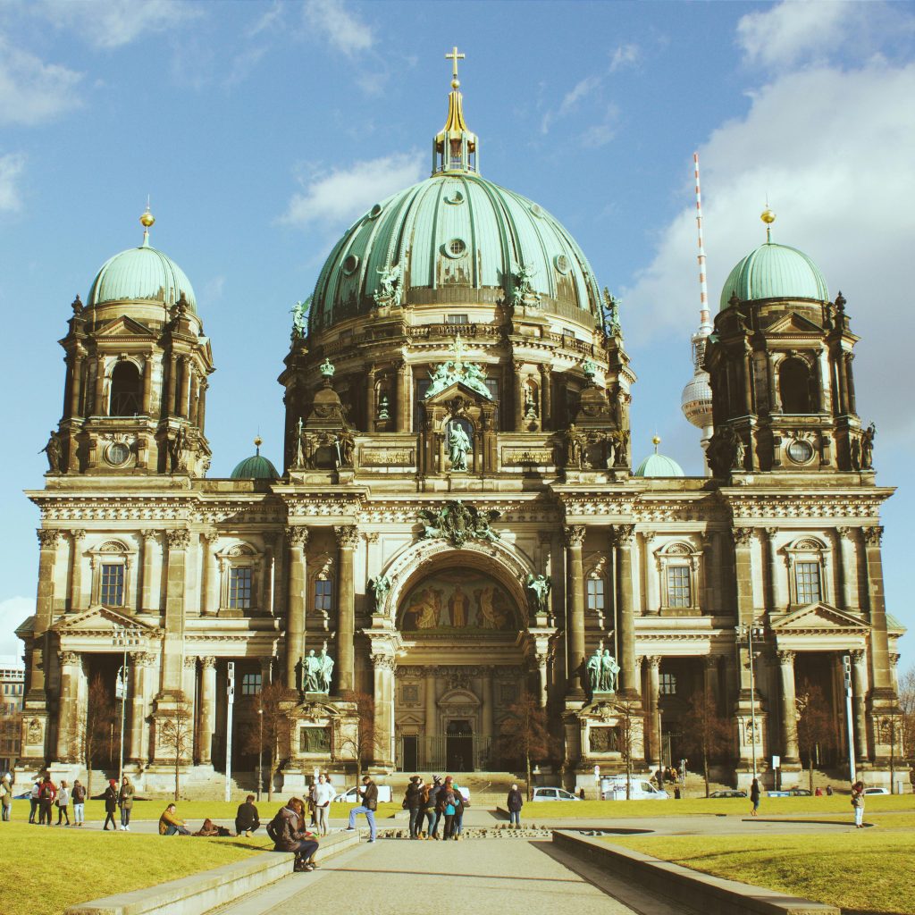 A beautiful capture of the Berlin Cathedral showcasing its architectural grandeur against a vibrant sky.